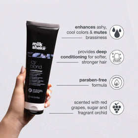 milk_shake creamy conditioner texture on palm hydrates hair