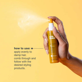 milk_shake oil applied to damp hair for heat protection and smoother blow-dry results