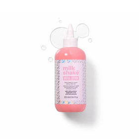 milk_shake bottle front view showing sleek packaging and benefit of instant shine