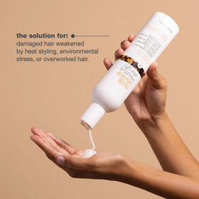 milk_shake conditioner on bathroom shelf in styled setting, suggests daily salon-quality care