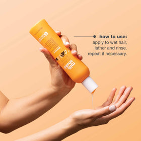 milk_shake shampoo in shower being rinsed, demonstrates gentle cleansing benefit