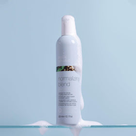 milk_shake shampoo on bathroom shelf in styling routine promoting balanced scalp care