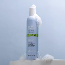 milk_shake bottle next to hand to show true product size