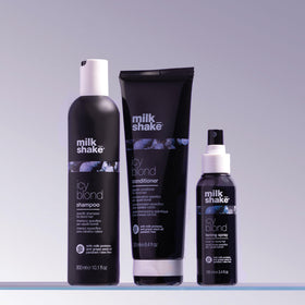 milk_shake on bathroom vanity among styling tools for convenient daily use