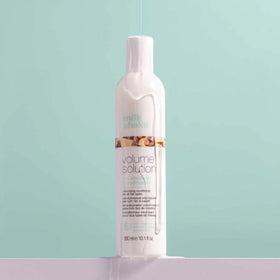 milk_shake conditioner in bathroom lifestyle setting suggesting daily use benefits
