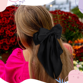 Mimorou bow worn in ponytail demonstrating instant polished styling