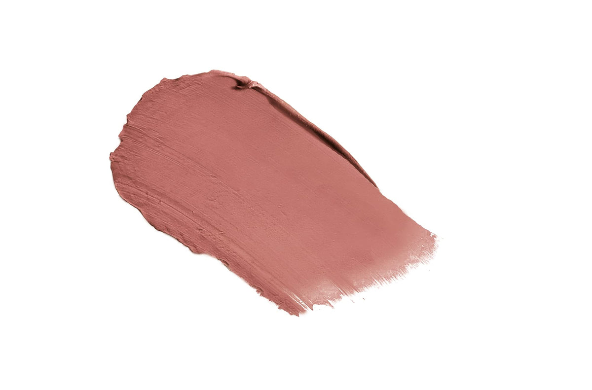 Mineral Fusion lipstick staged in a makeup bag for everyday portability and convenience