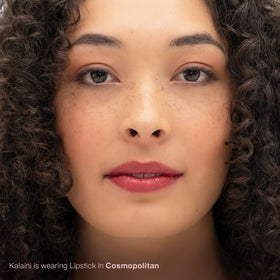 Mineral Fusion lipstick texture close-up reveals creamy buttery finish for smooth application