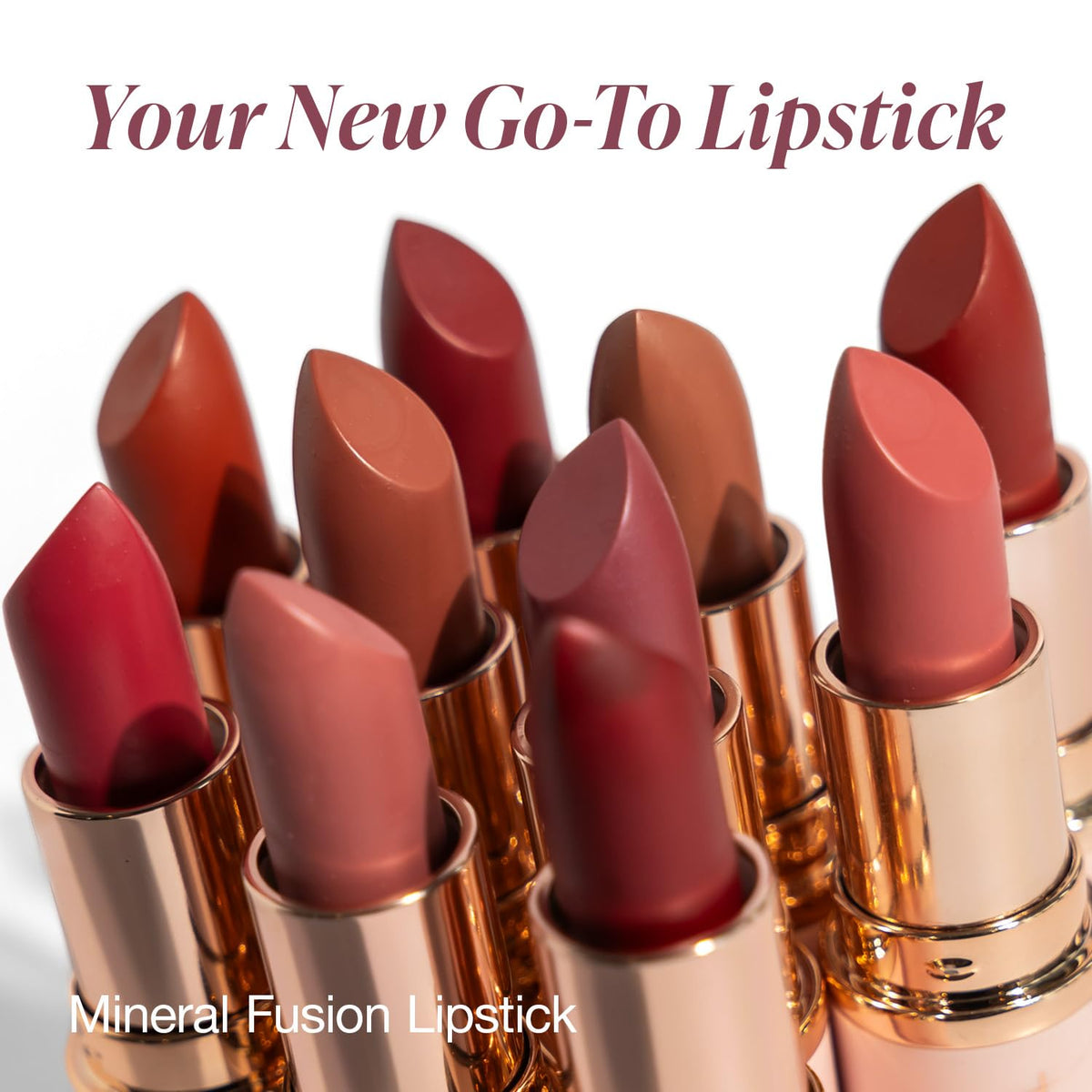 Mineral Fusion lipstick held in hand for size comparison and easy application benefit