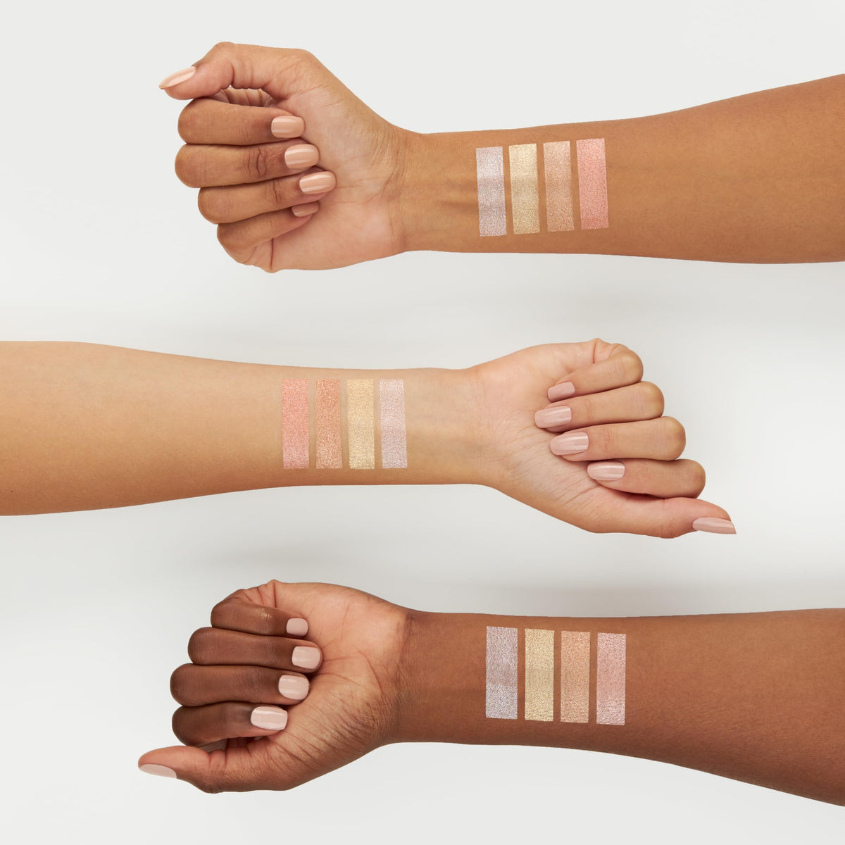 Mineral Fusion swatches on arm comparing shades and buildable glow for diverse tones