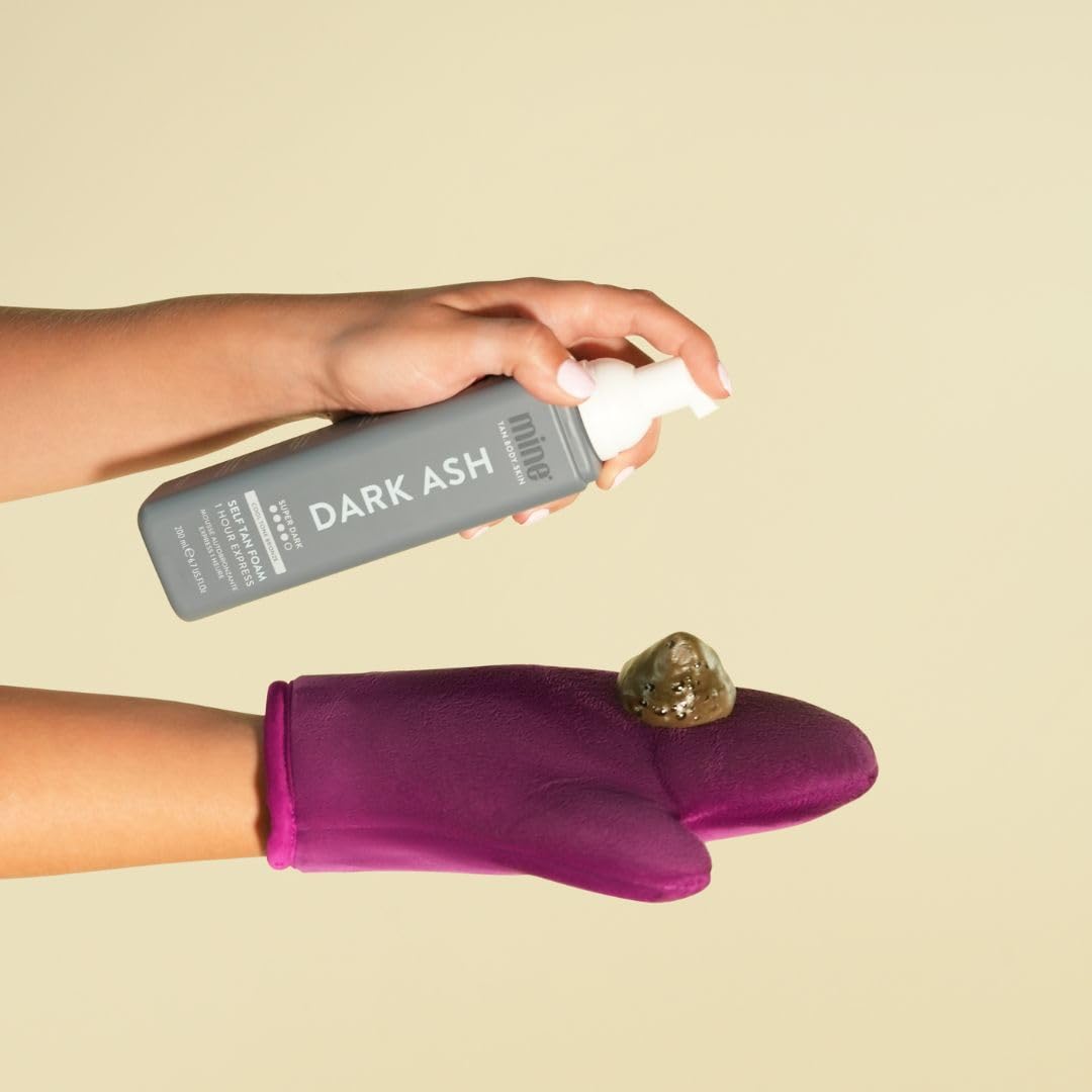 MINETAN BODY.SKIN bottle in hand conveying travel-friendly size