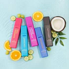 MINETAN BODY.SKIN size comparison in hand showing travel-friendly 6.7 fl oz convenience