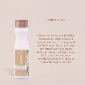 Miracles By Milagros bottle in hand to show true size and travel ease
