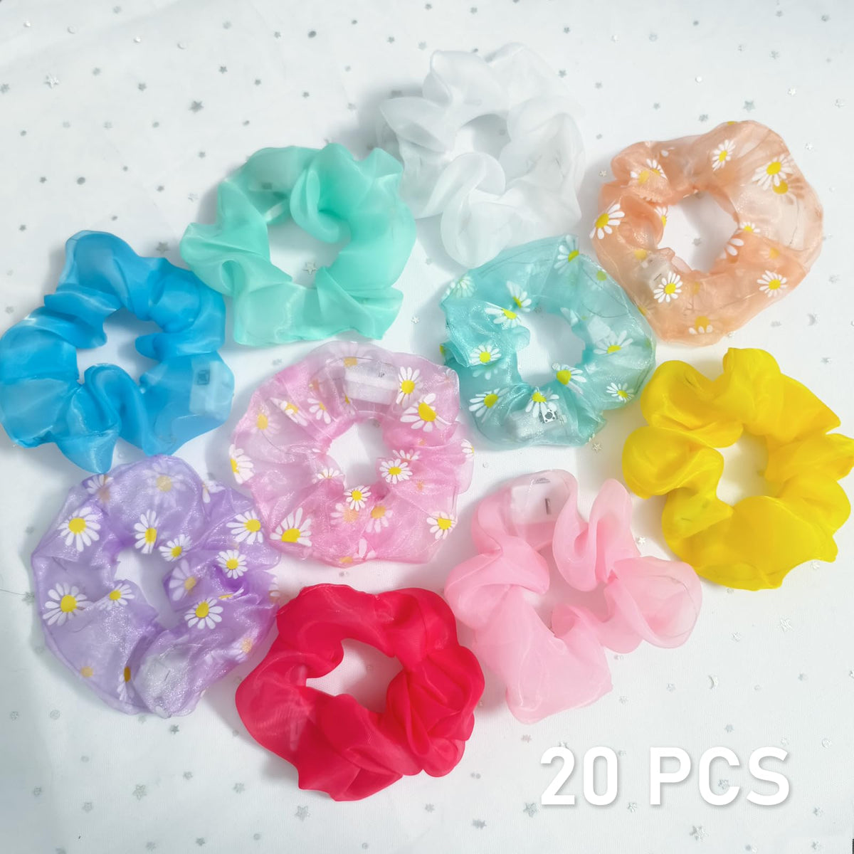 MiraWish scrunchie held in hand for size comparison and comfortable fit