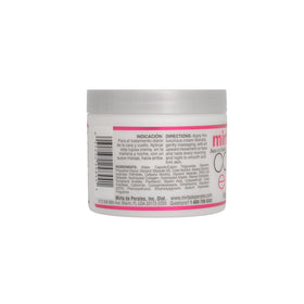 Mirta De Perales jar in hand showing size and portable skincare benefit
