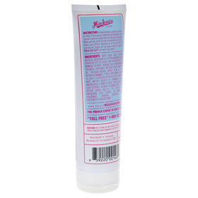 Miss Jessie's lotion being applied to damp curls demonstrating effortless distribution and reduced frizz