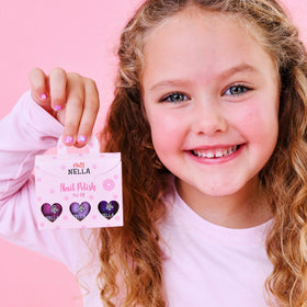 MISS NELLA lifestyle image of a child wearing polish for playful look