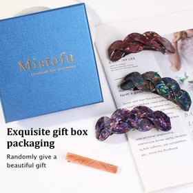 Mistofu barrette in use creating a half-up hairstyle for secure styling