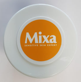 Mixa on bathroom shelf with towel showing daily routine convenience
