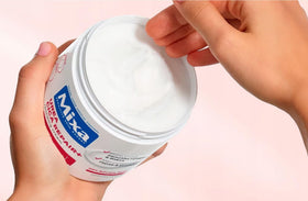 Mixa cream texture close-up highlighting fast absorption benefit