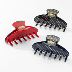 Mixcbe clip held in hand shows scale and ease of use for thick hair