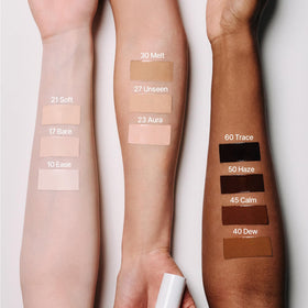 mixsoon model applying product to cheek for natural luminous finish