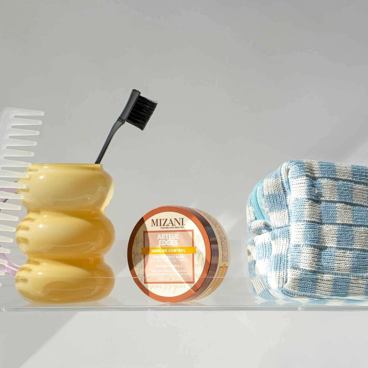 Mizani used to blend wig edge for seamless, natural-looking finish