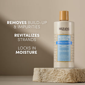Mizani charcoal texture close-up highlighting clarifying ingredient and purity