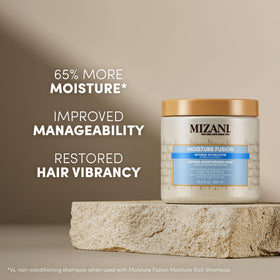 Mizani open jar close-up of creamy texture, emphasizes rich moisturizing feel
