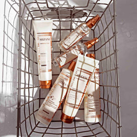 Mizani Smooth Guard with coconut oil visual emphasizing smoothing benefit