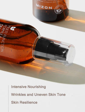 MIZON essence in hand illustrating small amount needed for hydration