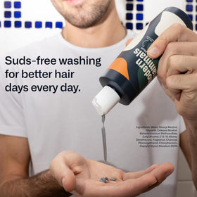 Modern Mammals bottle on shower ledge showing no-suds cleansing benefit