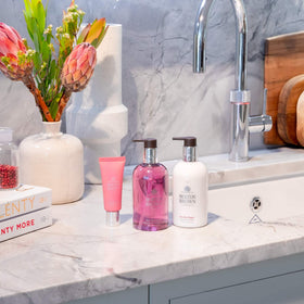 Molton Brown bottle label detail highlighting fragrance notes and vegan formula