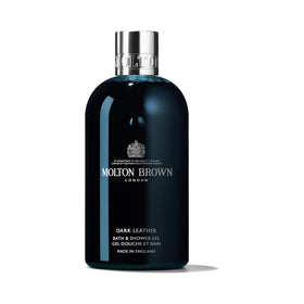 Molton Brown front bottle showing dark leather packaging and premium finish