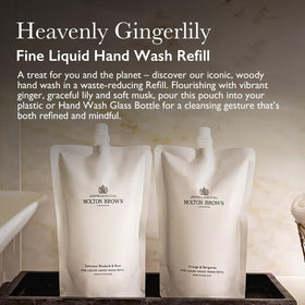 Molton Brown pouring refill into glass bottle for sustainable refill