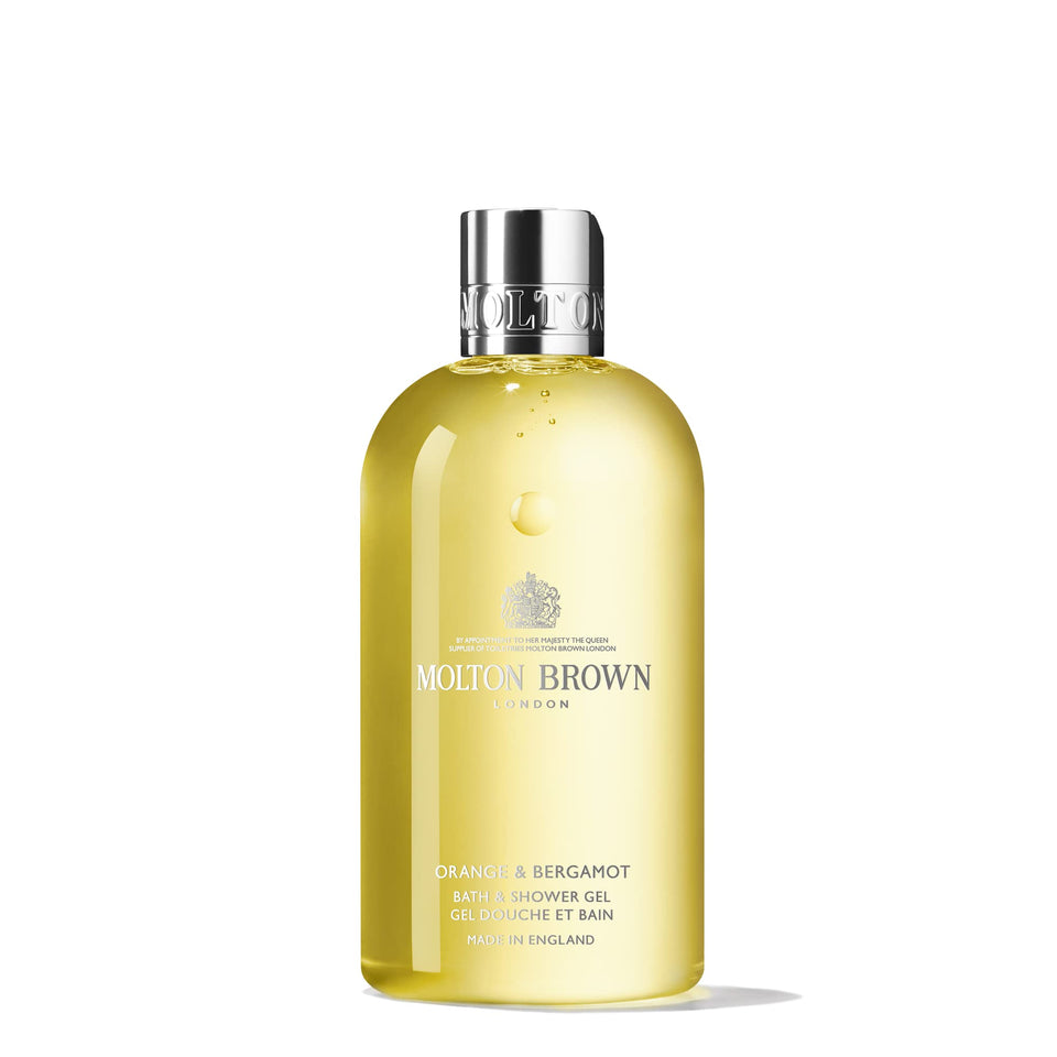 Molton Brown front bottle showing orange & bergamot design and clear branding