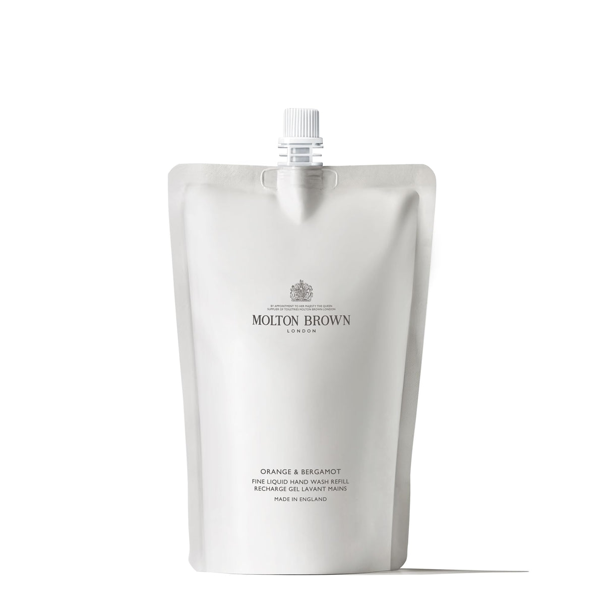 Molton Brown front packaging showing refill pouch and brand benefit of reduced plastic