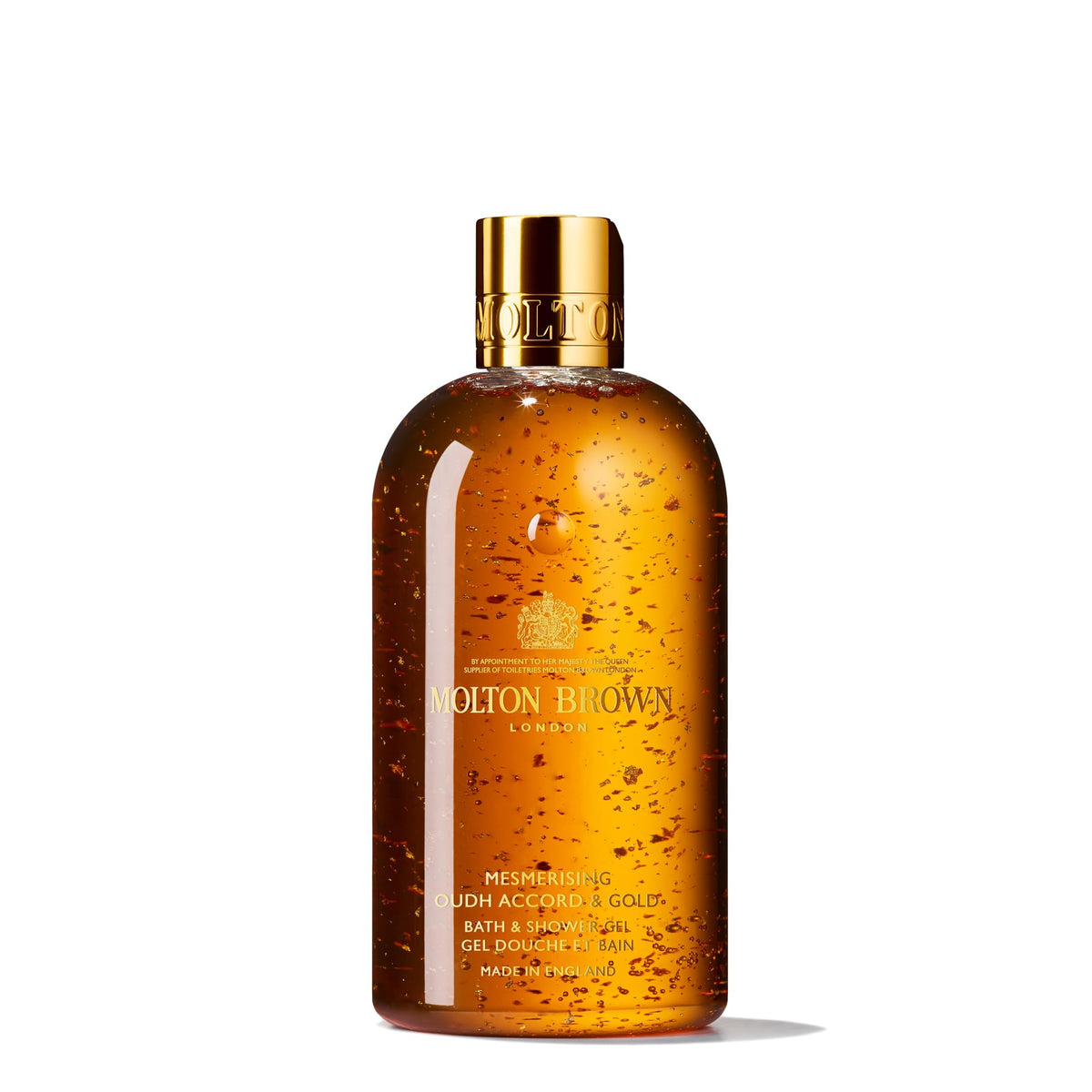 Molton Brown bottle front packaging showing elegant gold shimmer and luxury scent