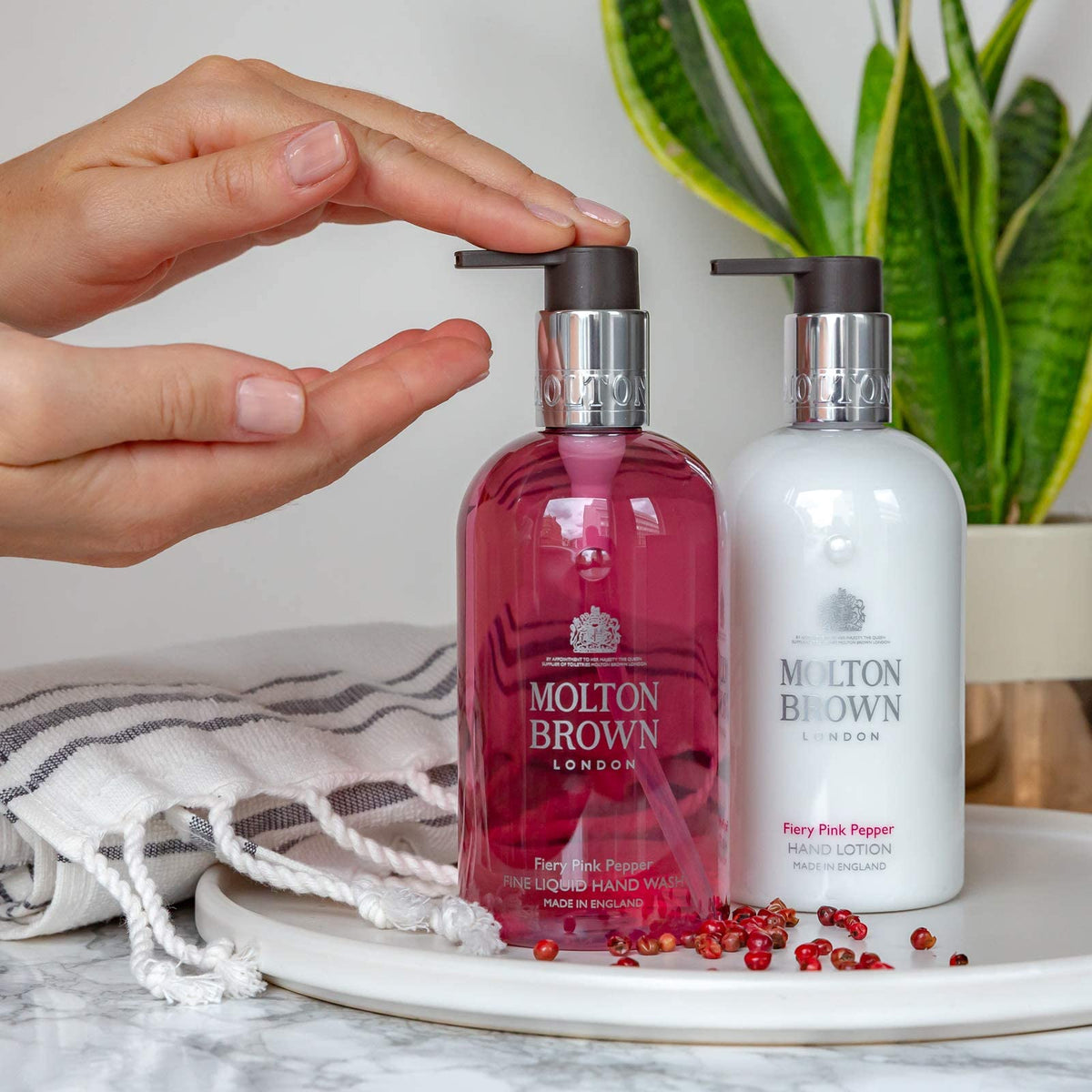 Molton Brown 10 fl oz size comparison showing compact bottle for countertop use