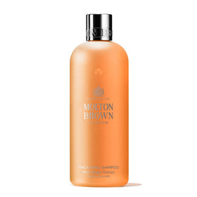 Molton Brown front bottle view showing label and packaging, conveys premium quality
