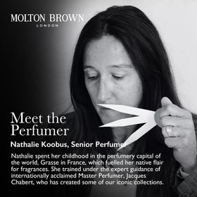 Molton Brown body wash in shower setting offering invigorating routine benefit