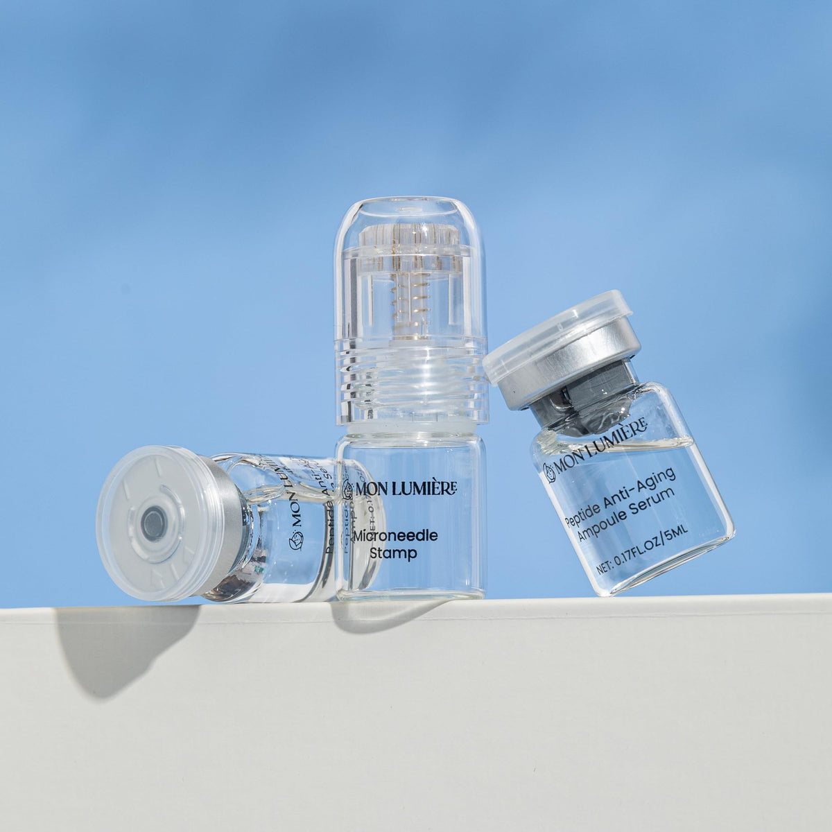 Mon Lumière kit in travel pouch lifestyle scene showing portable, hygienic skincare