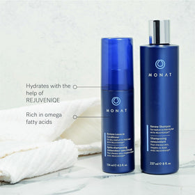 MONAT bottle in hand for size comparison, clarifies 250ml capacity and portability