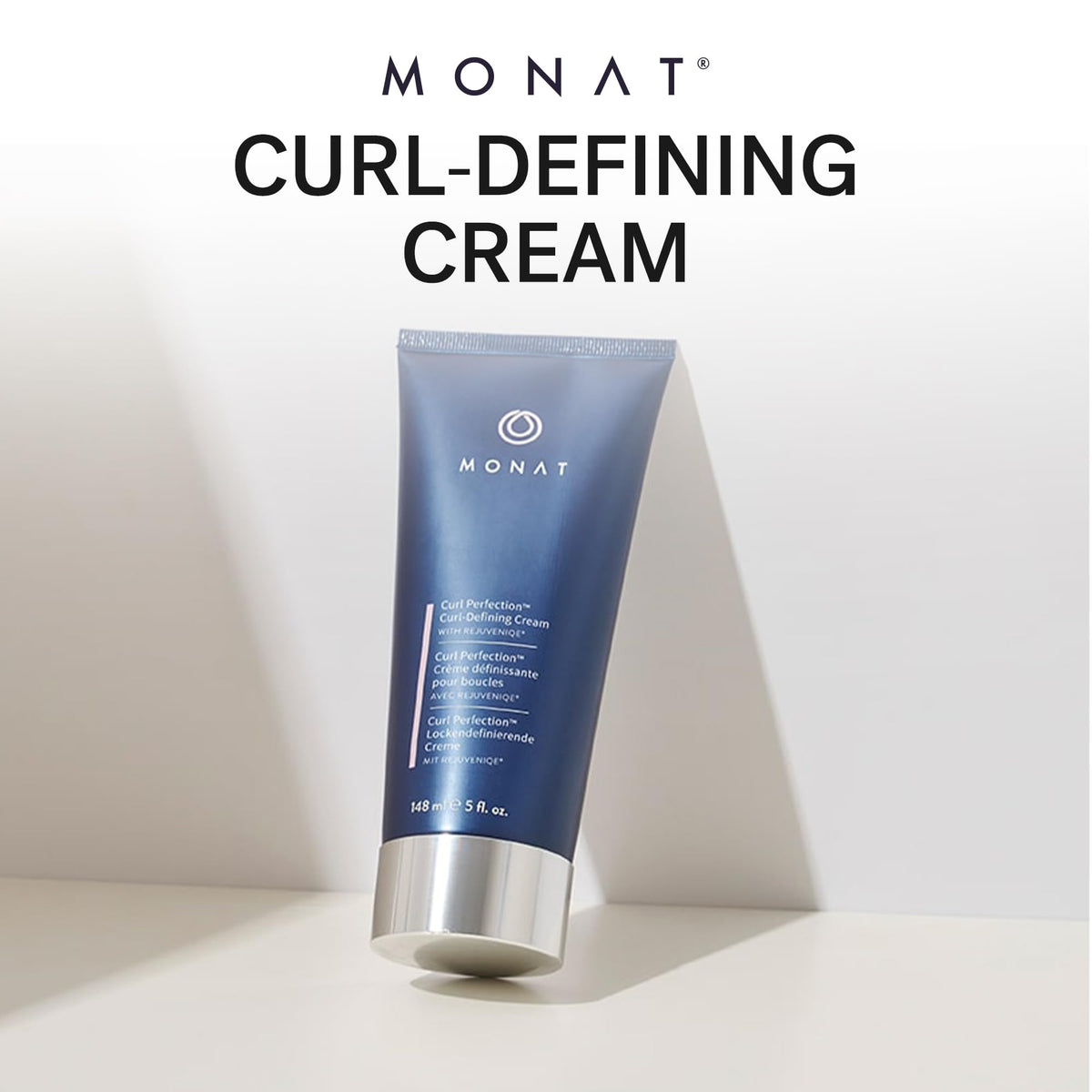 MONAT curl perfection being applied to damp hair for defined curls