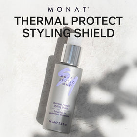 MONAT bottle in hand during application showing simple, quick heat protection