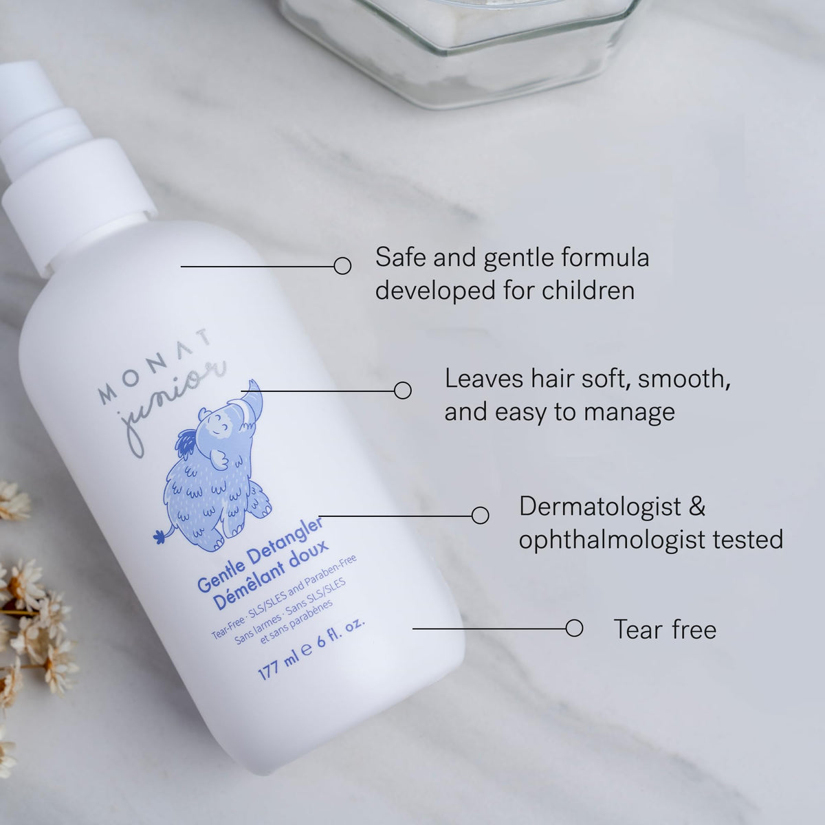 MONAT Junior texture droplet on finger highlighting lightweight formula and slip