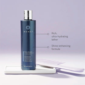 MONAT REJUVENIQE oil blend close-up showing nourishing ingredient benefit