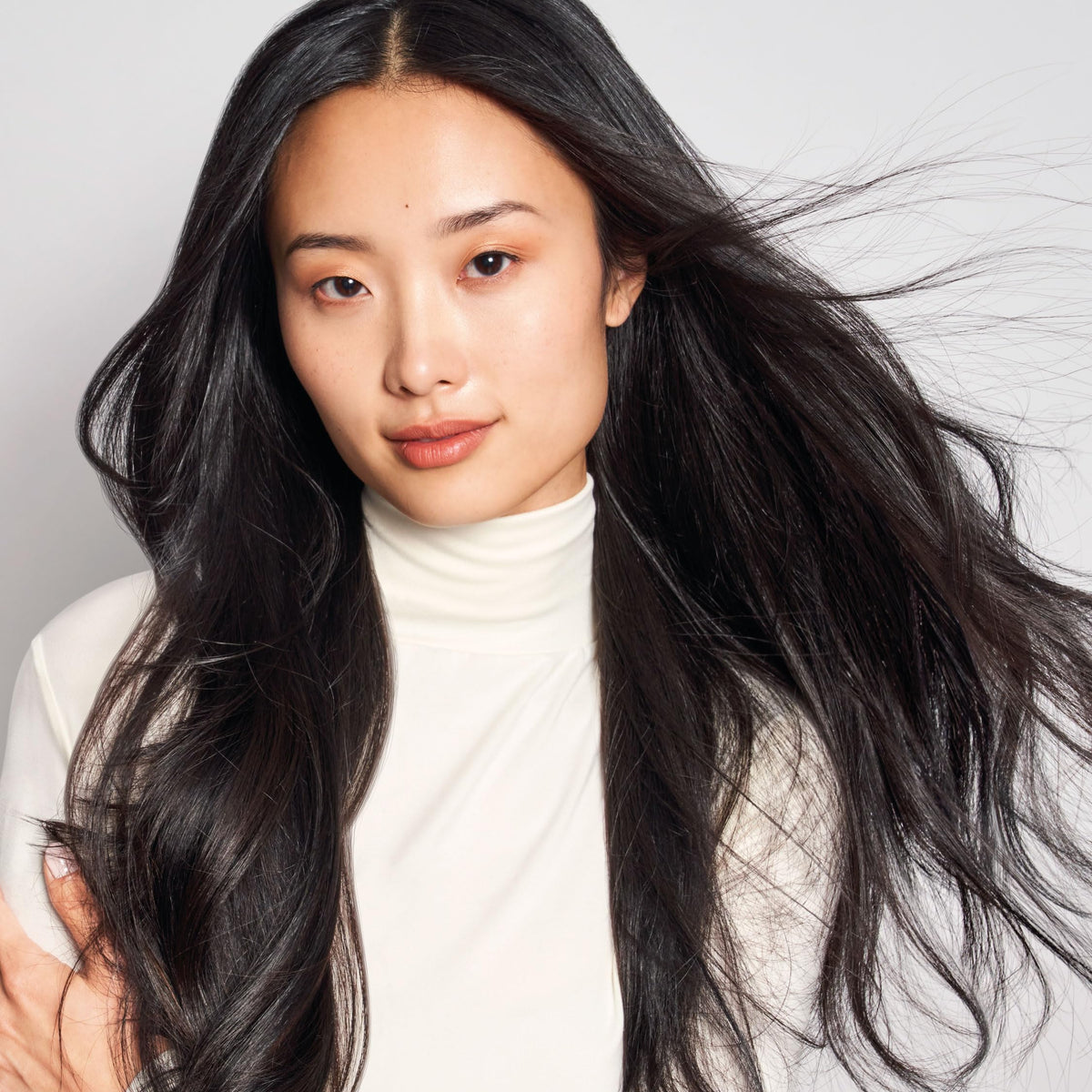 MONAT pea extract visual indicating strengthening benefit for hair