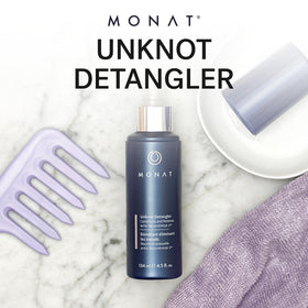 MONAT Unknot Detangler texture mist on hair showing lightweight finish and instant slip benefit