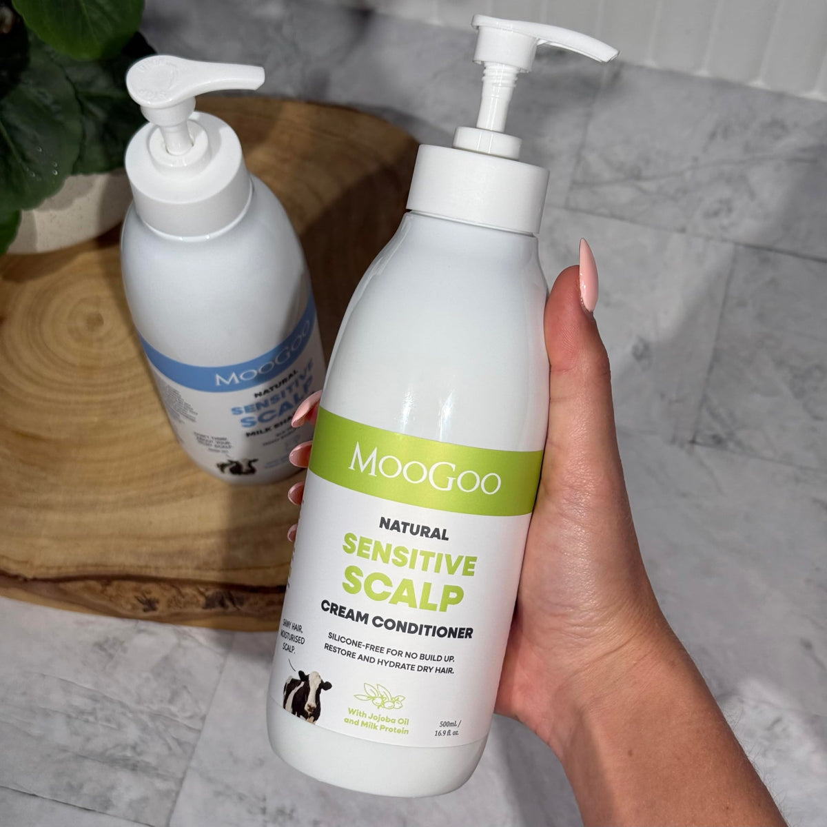 MooGoo cream conditioner texture swipe illustrating lightweight hydration